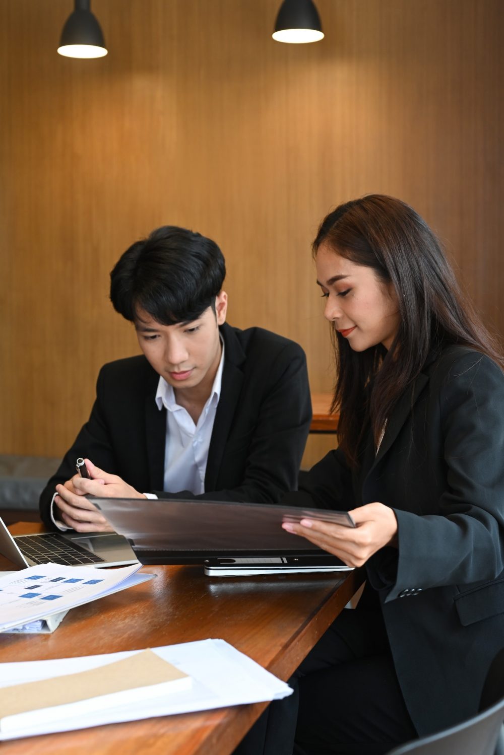 two-business-partners-discussing-financial-reports-together-in-modern-workplace–e1670796180444.jpg two-business-partners-discussing-financial-reports-together-in-modern-workplace--e1670796180444.jpg